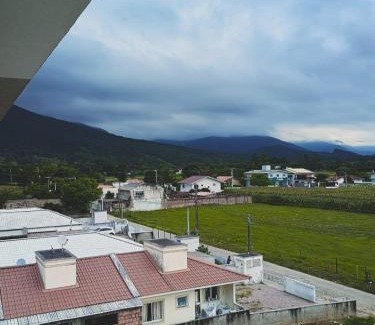 Palhoca Apartment | Quarto morro do cambirela