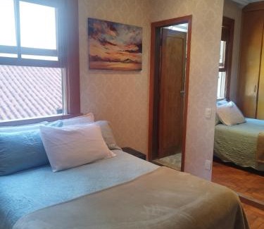 Savassi House | Quarto Suite -Em apartamento familiar