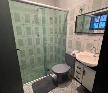 Jardim Primavera House | Quarto suite em Caraguatatuba