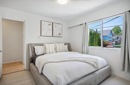 Riley Park Apartment | Queen Elizabeth Garden Stay with Parking and King Bed for 6