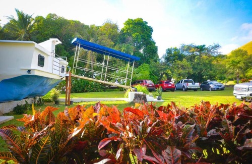 Merizo House | Queen Malesso Houseboat