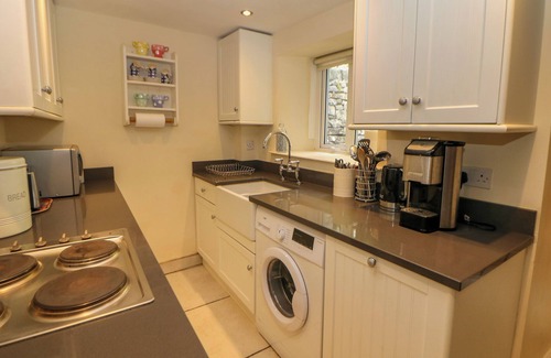 Tideswell Cottage | QUEEN'S COTTAGE, with open fire in Tideswell
