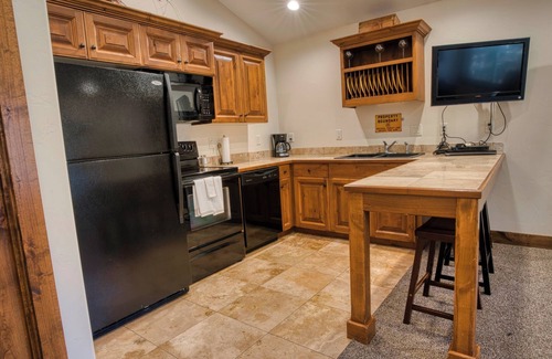 Island Park Cabin | Queen Suite at Ponds Lodge Cabin 31 Unit 1