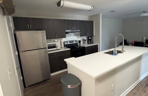 Tampa Apartment | Queen Suite Upscale Comfort + Privacy