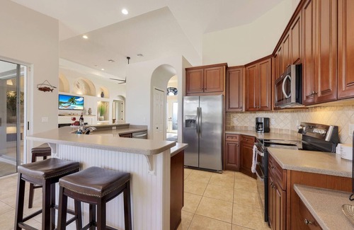 Burnt Store House | Quick Gulf Access Pool/Spa Home with Games Room + Tiki Hut