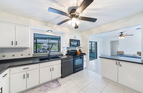 Cape Coral House | Quiet 2+ bedroom with sleep in Florida room, pool, spa and Gulf Access!