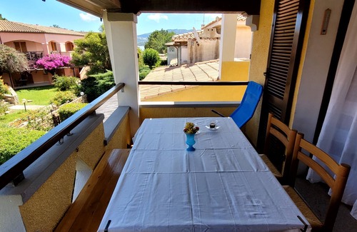 Cannigione Apartment | Quiet apartment with sea view balcony, 5 mins to beach and shops