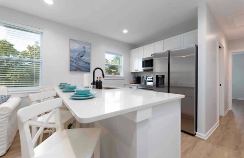 Neptune Beach Apartment | Quiet beach oasis, walk to the beach!