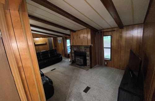Flint Creek Cabin | Quiet cabin in the woods w/access to pools, river, & lakes in gated community!
