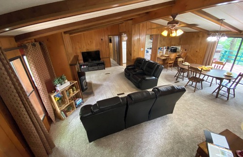Flint Creek Cabin | Quiet cabin in the woods w/access to pools, river, & lakes in gated community!