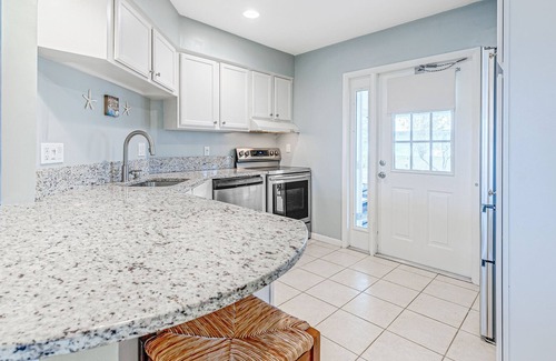 Ormond Beach Plaza House | Quiet coastal getaway with fenced yard, screened lanai, & central AC