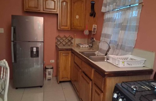 Saint John Parish Villa | Quiet cozy family friendly home close to stadium and airport. Pet-friendly!