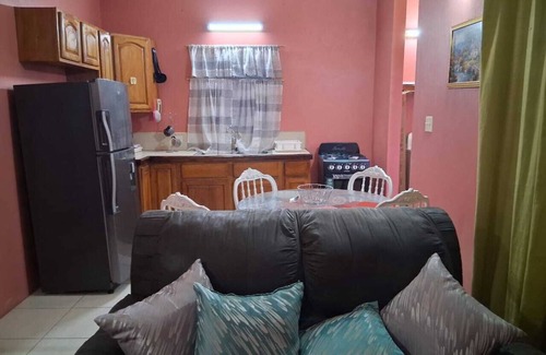 Saint John Parish Villa | Quiet cozy family friendly home close to stadium and airport. Pet-friendly!