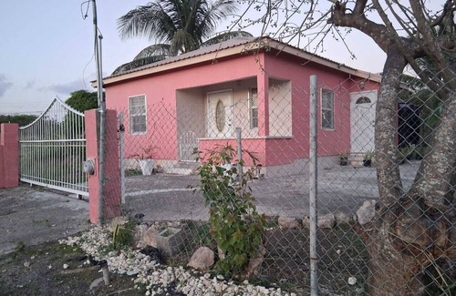 Saint John Parish Villa | Quiet cozy family friendly home close to stadium and airport. Pet-friendly!