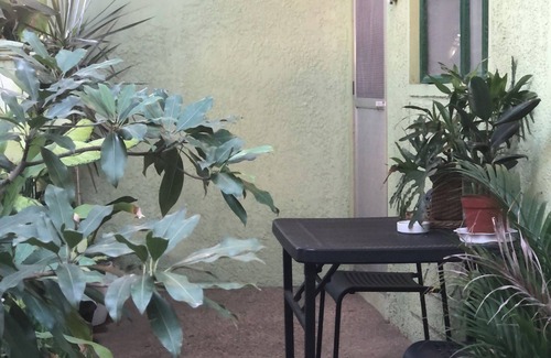 Bacoor City House | Quiet Garden Home, 1 bedroom with attic in Bacoor with WiFi, AC. Book now