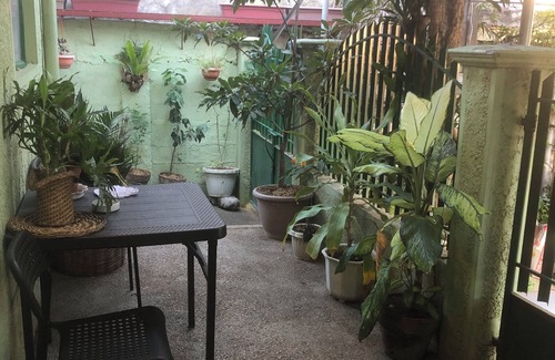 Bacoor City House | Quiet Garden Home, 1 bedroom with attic in Bacoor with WiFi, AC. Book now