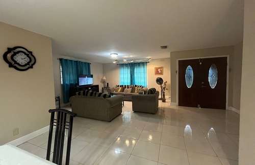 Bahamas Terrace House | Quiet getaway near Xanadu Beach, Freeport with Central Air, WiFi & free parking.