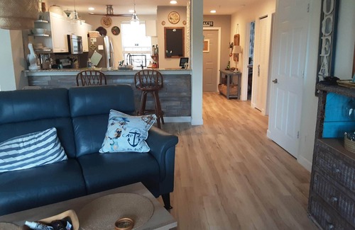 Bonita Shores Condo | Quiet ground floor, corner unit on the lake minutes from Barefoot Beach