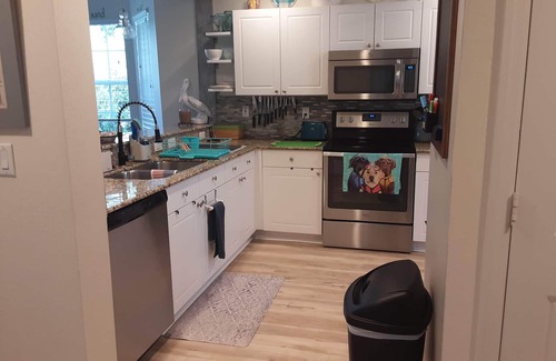 Bonita Shores Condo | Quiet ground floor, corner unit on the lake minutes from Barefoot Beach