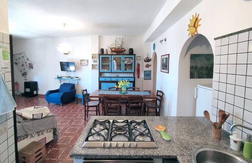 Sa Rocca Tunda Apartment | Quiet Ground Floor Apartment 20 meters from the Sea with Private Garden & BBQ