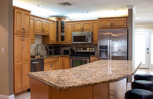 Largo House | Quiet home with Salt Water Heated Pool, next to Largo Golf Course & IRB!