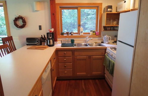Marquette Apartment | Quiet, isolated oasis on 300 feet of Lake Superior beach and 10 wooded acres.