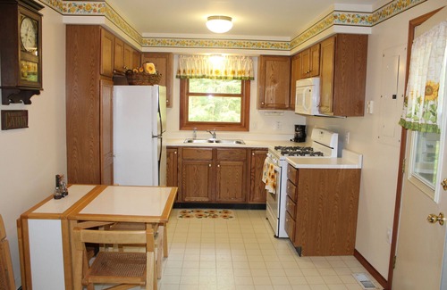 Alger Cabin | Quiet Lakefront Cabin with Private Fire Pit, Beach and Dock