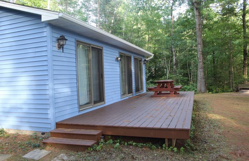 Alger Cabin | Quiet Lakefront Cabin with Private Fire Pit, Beach and Dock