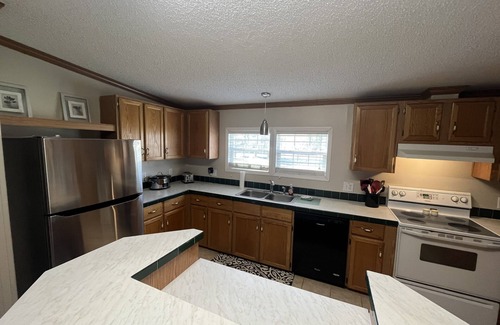 King House | Quiet., Large home on 2 acre estate that can host large groups close to town.