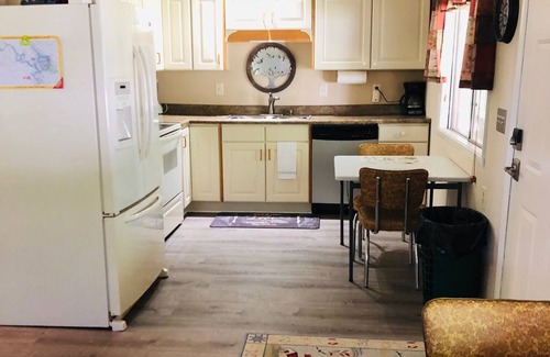Sunrise Beach House | Quiet neighborhood, 2 Bedroom house, Lake front with dock, close to town