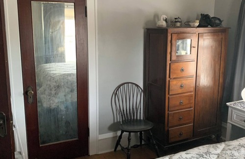 Cedar Rapids House | Quiet Relaxing bedroom with queen sized bed 2nd floor. Shared bathroom.