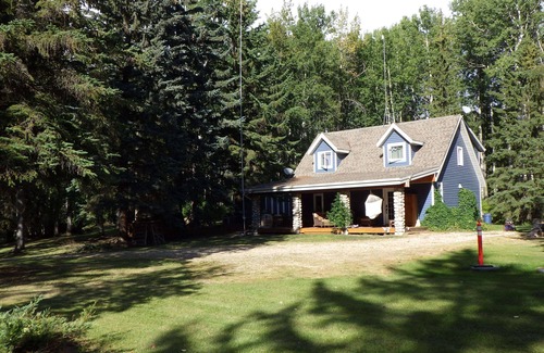 Parkland County House | Quiet , secluded , 5 acres outdoor fireplace , indoor wood stove , hot tub