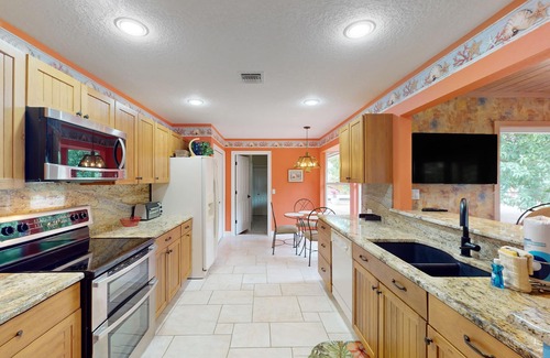 Sebastian Highlands House | Quiet tropical haven with children's items, covered patio, grill, smart TV, & AC
