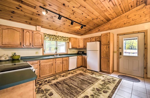 Dresser Cabin | Quiet Waterfront Round Lake Home w/Hot Tub