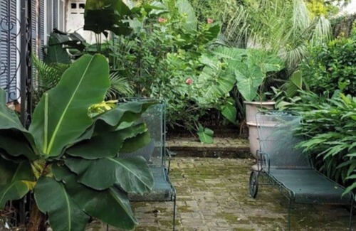 French Quarter Apartment | Quintessential French Quarter Cottage with Lush Courtyard