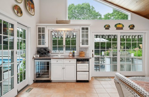 Quogue House | Quogue Village Contemporary with Pool, Spa, & Har-Tru Tennis Court