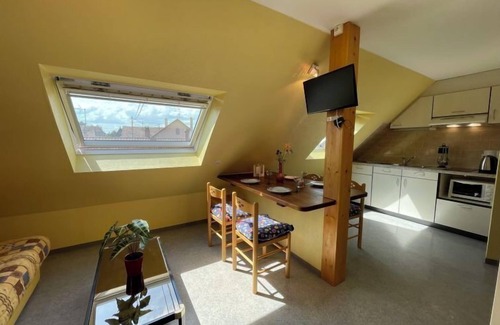 Marckolsheim Apartment | Résidence jaune et rose by Interhome