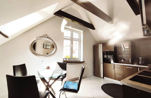 Old Town Apartment | RABE Old Town Apartment – Two-Level Retreat Above the Rooftops of Gdańsk