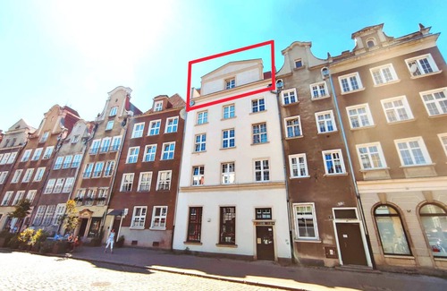 Old Town Apartment | RABE Old Town Apartment – Two-Level Retreat Above the Rooftops of Gdańsk