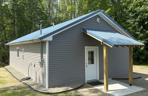 Dexter Cabin | Rail Trail Retreat! Recently remodeled cozy home on Snowmobile/ATV Trail!