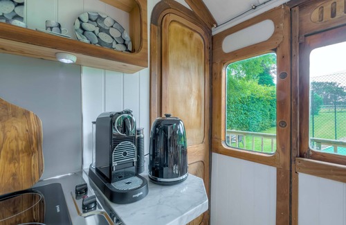 Walberton House | Railway carriage accommodation with tennis court!