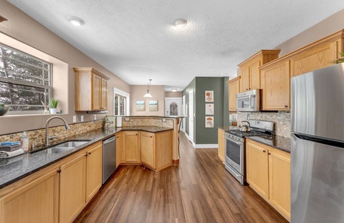 Baldwin Cottage | Rainbow Lake Luxury Beachfront Oasis with Hot Tub! - Hosted by Simple Lyfe Stays