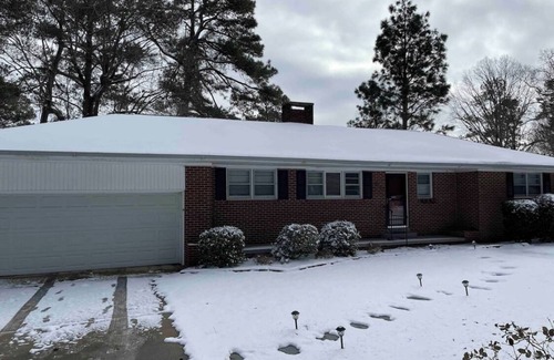 Sanford House | Ranch style brick home (Private room)