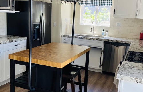 Orange House | Ranch Style free standing 1 bedroom home with its own yard and view