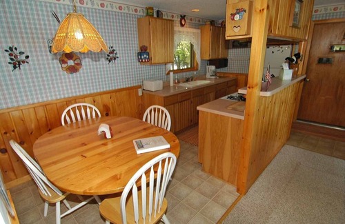 Cable House | Ranch-Style Seidls Home Feet away to Lakeshore by RedAwning