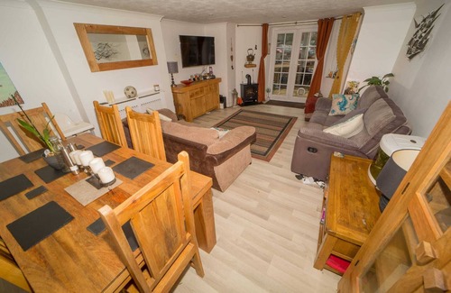 Meads Apartment | Rare basement flat in best location,free parking on site, private sunny patio