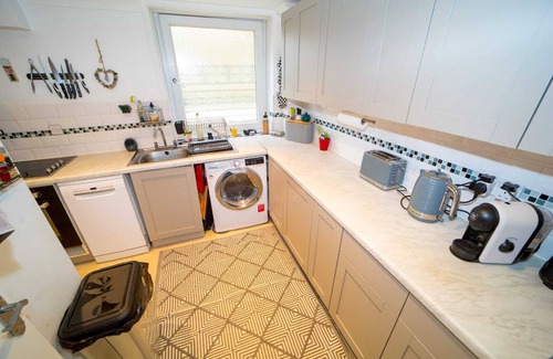 Meads Apartment | Rare basement flat in best location,free parking on site, private sunny patio