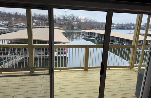 Osage Beach Condo | RARE CONDO, WALK OFF YOUR DECK TO THE LAKE! Only a few August dates left!