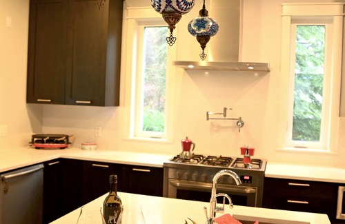 Metro Vancouver Regional District House | Rare Find! A Home Nestled in Forest, Lake & Fjord!