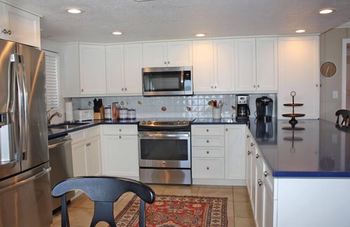 New Smyrna Beach Condo | Rare three bedroom end condo. Two bedrooms face the ocean with private balcony from Master bedroom.